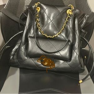 Quilted Black Leather Shoulder Bag with Gold Chain Accent